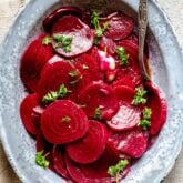 overhead of pickled beets in a bowl