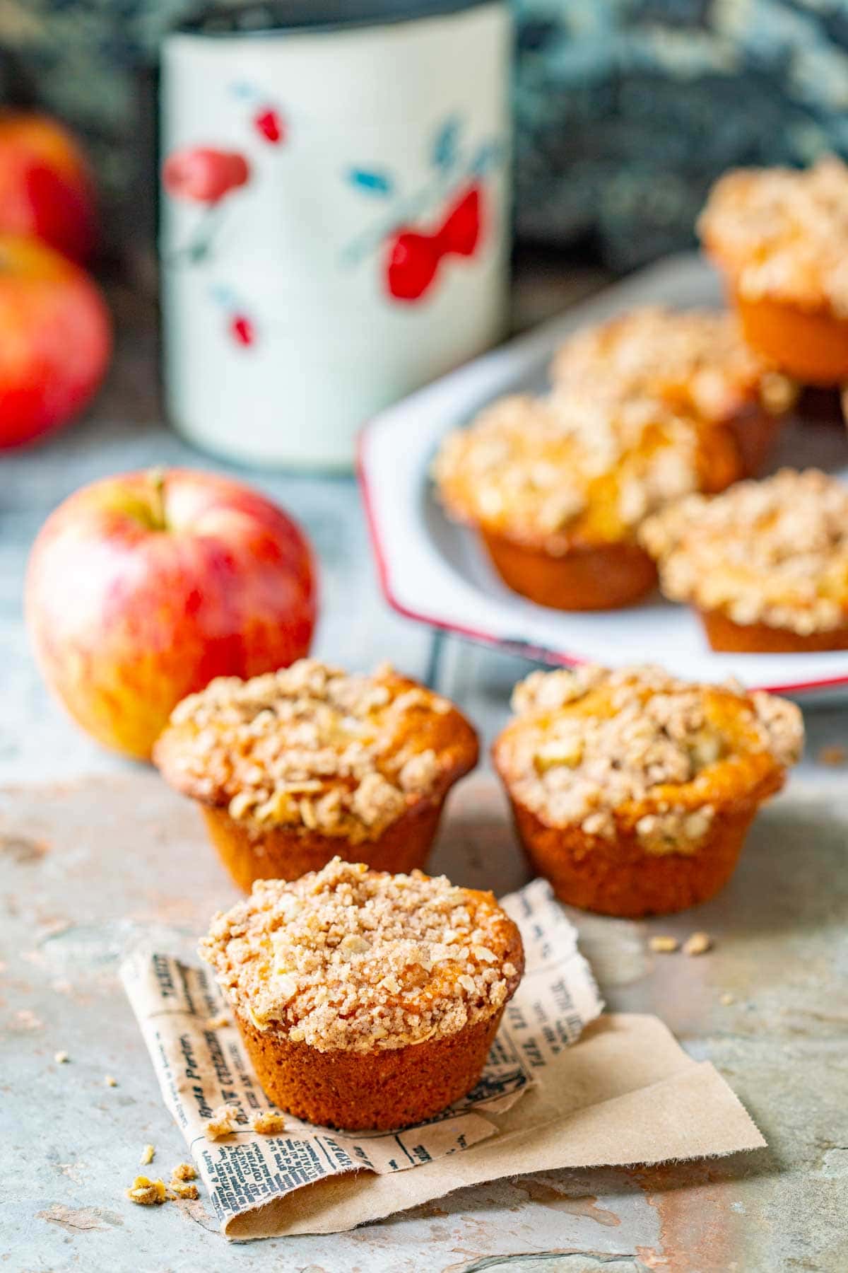 the apple muffins in a kitchen with a flour sifter with apple motif