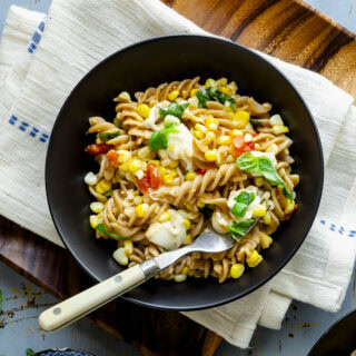 closeup of the pasta with corn from overhead