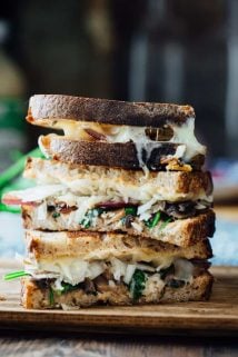 This Skinny Vegetable Reuben is loaded with saut&eacute;ed mushrooms, onions and spinach, topped with lacto-fermented sauerkraut and sauced with home-made skinny Russian dressing. It is ready in less than 30 minutes for an awesome vegetarian meal the whole family will love! | Healthy Seasonal Recipes | Katie Webster