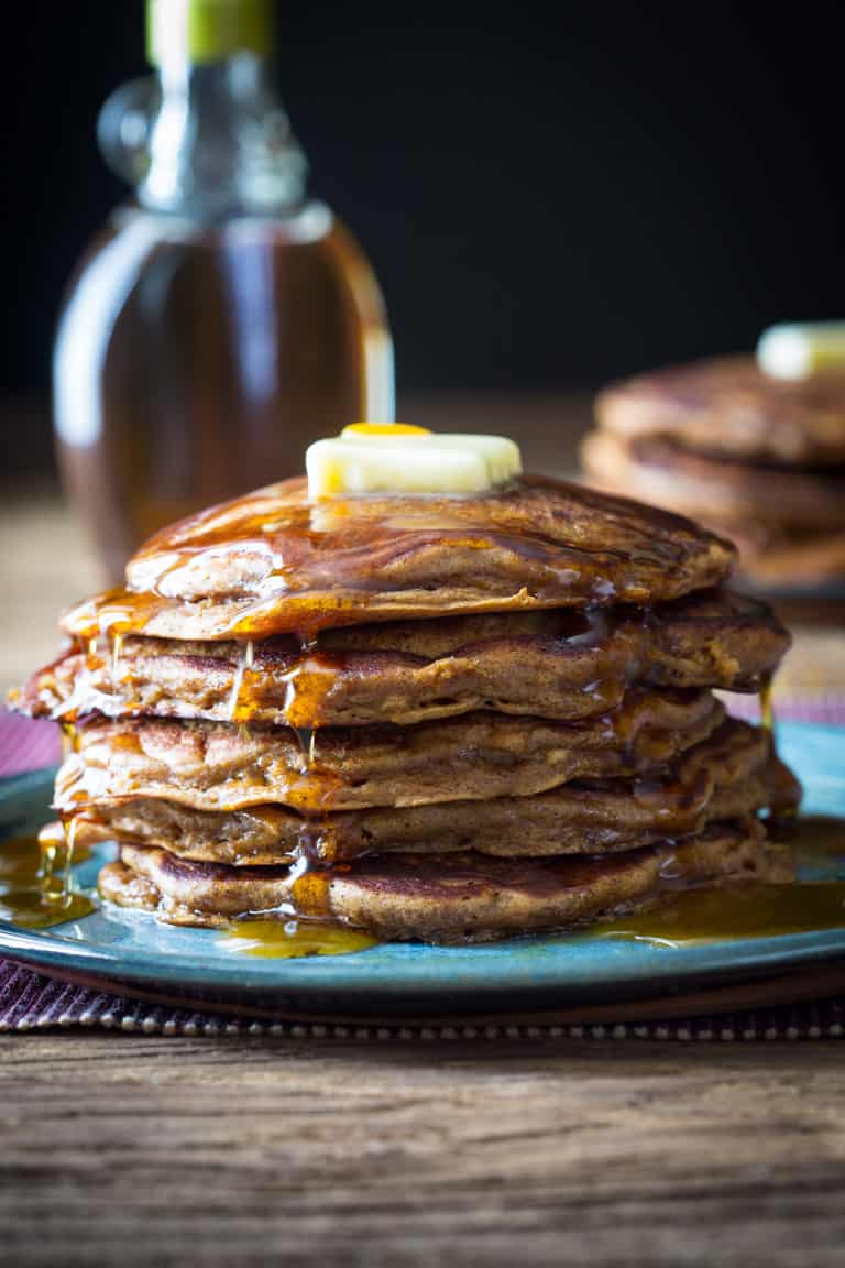 Apple Gingerbread Pancakes on a teal plate