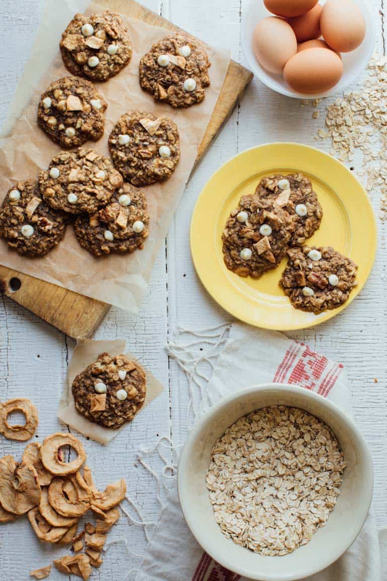 Healthy Apple Cookies on a serving plate and cutting board