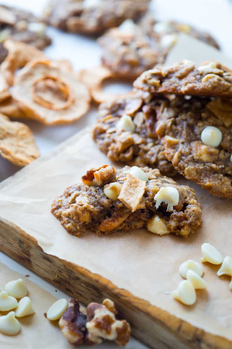 Chewy Oatmeal cookies, with white chocolate chips, walnuts and chunks of dried apple rings added in for a fall twist! | Healthy Seasonal Recipes | Katie Webster