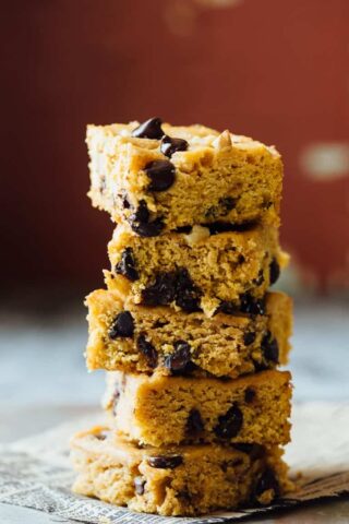 These Sweet Potato Blondies are chocked full of chocolate, toasted walnuts and are veggie packed, whole wheat and 100 calories less than the traditional version.Perfect for all of your Fall activities! | Healthy Seasonal Recipes