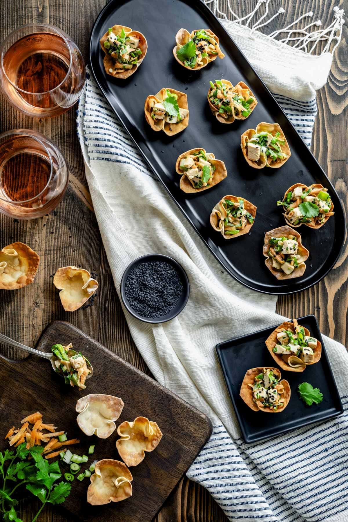 overhead of the table scape with the platter of the wonton bites