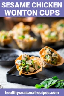 Sesame wonton cups on a black platter