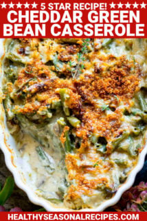 CLOSEUP OF CHEDDAR GREEN BEAN CASSEROLE IN WHITE DISH WITH TEXT