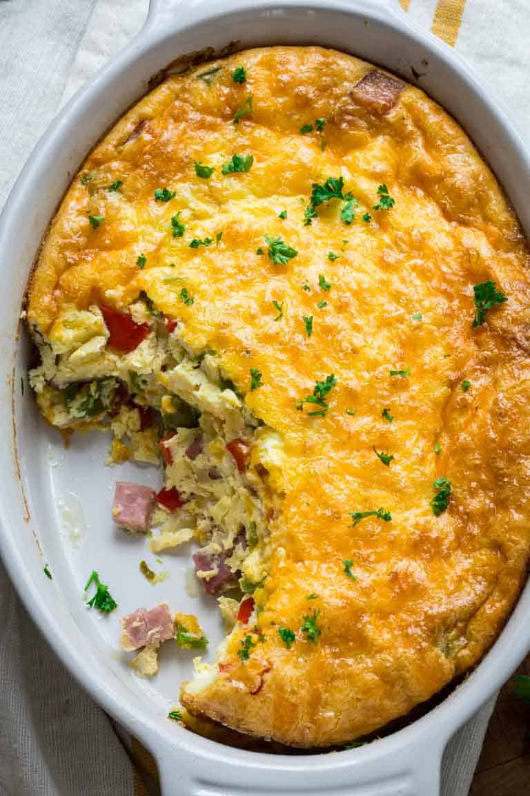 This easy and family friendly Baked Denver Omelet serves 8 and is ready in just 45 minutes! Bonus... it’s great reheated and even makes an awesome lunch or dinner. | Healthy Seasonal Recipes | Katie Webster