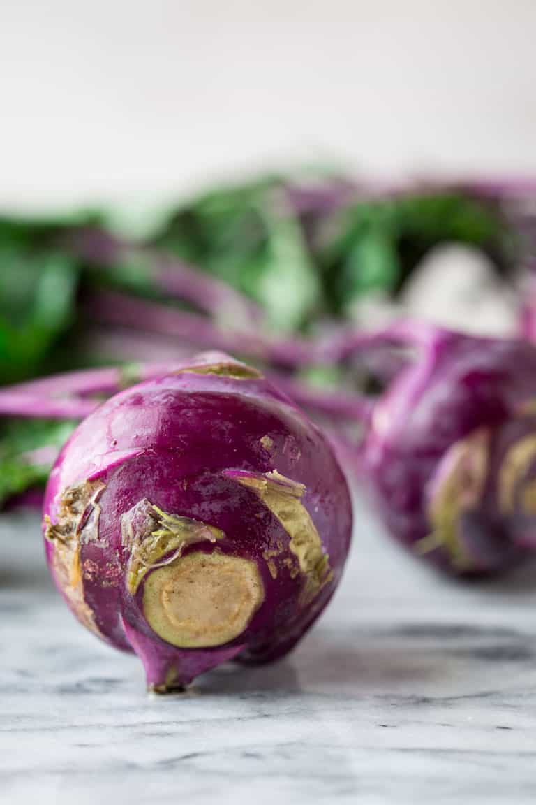 a close-up of a purple kohlrabi bulb