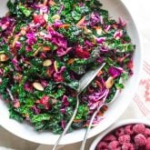 Festive Kale Slaw with Raspberries and Almonds, a festive gluten-free, vegan-friendly salad for Christmas or the holidays