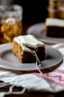 a slice of the cake with a fork cutting into it