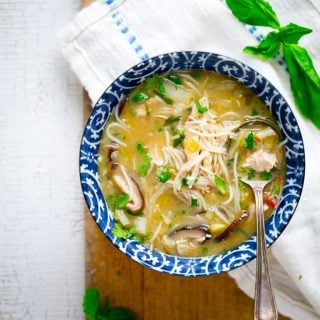 Slow Cooker Thai Coconut Chicken Soup with Red Peppers, Napa Cabbage and Cellophane Noodles, a healthy weeknight dinner on HealthySeasonalRecipes.com