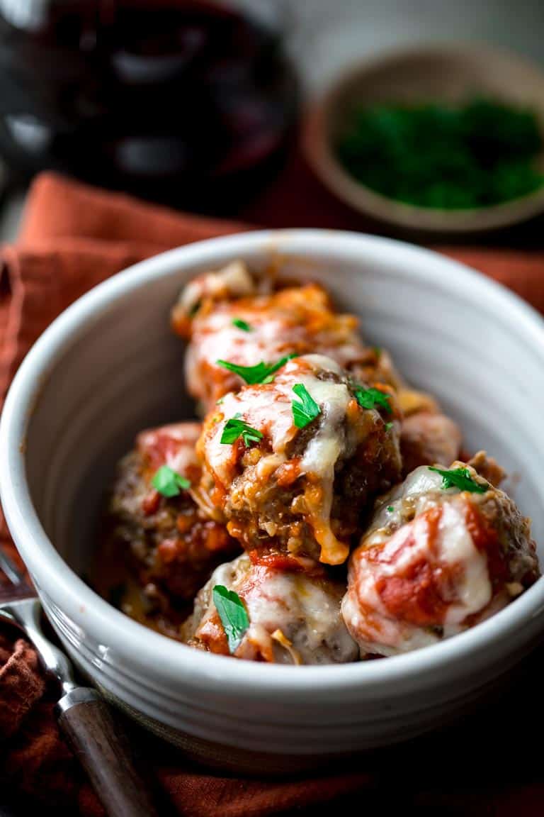 oven baked meatballs with parmesan in a bowl