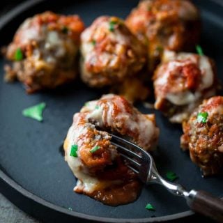 A close up of fork in a Meatball