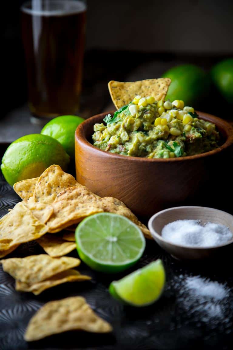 Corn and Bacon Guacamole with a touch of smoked paprika for added smokiness. Gluten-free appetizer for the superbowl or cinco de mayo. @healthyseasonal #glutenfree #appetizer #guacamole #party #superbowl #cincodemayo