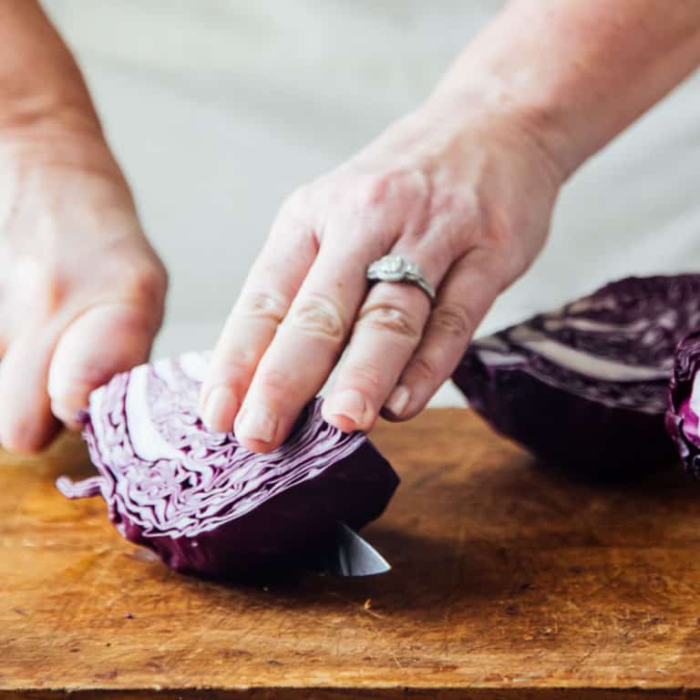 cut the cabbage into smaller wedges to make shredding easier | Healthy Seasonal Recipes