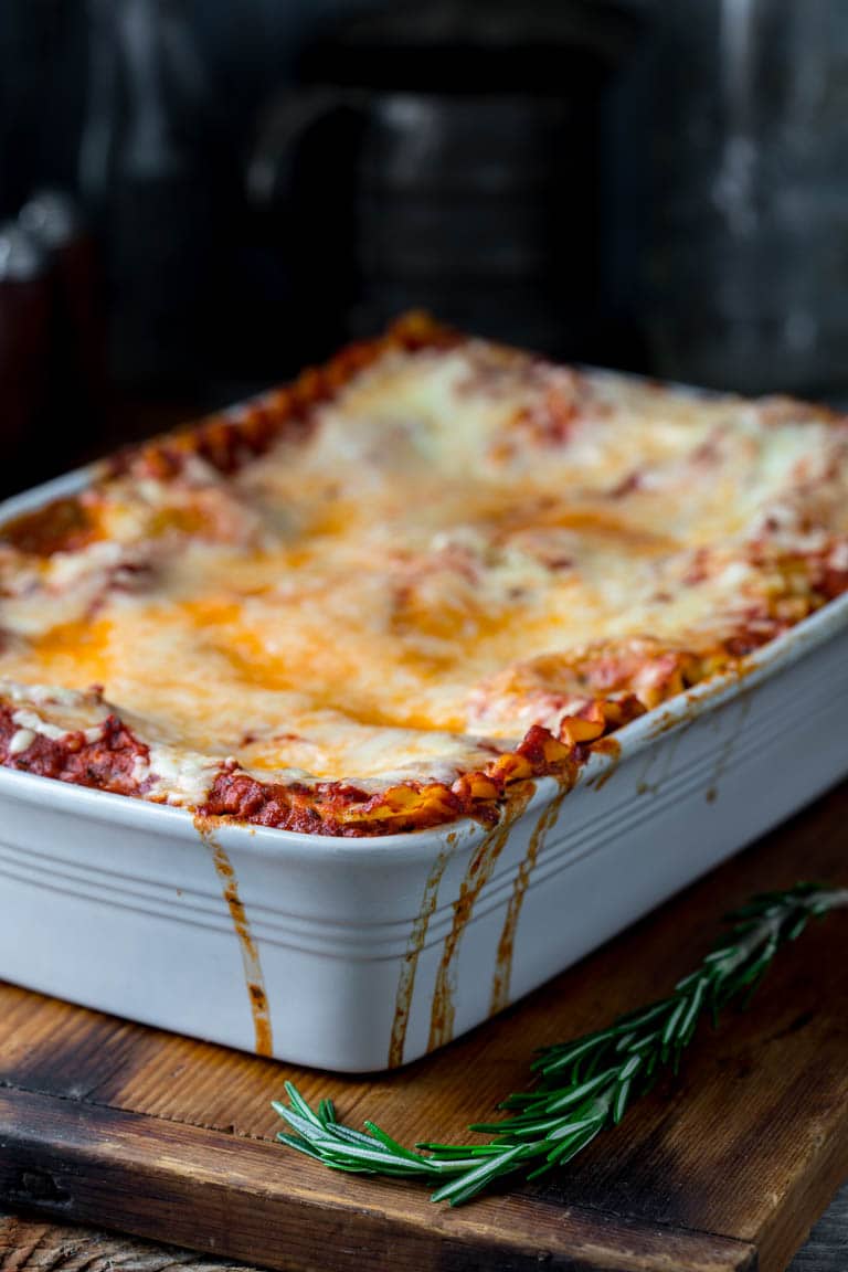 Vegetarian Caramelized Onion and Portabella Mushroom Lasagna in a white baking dish