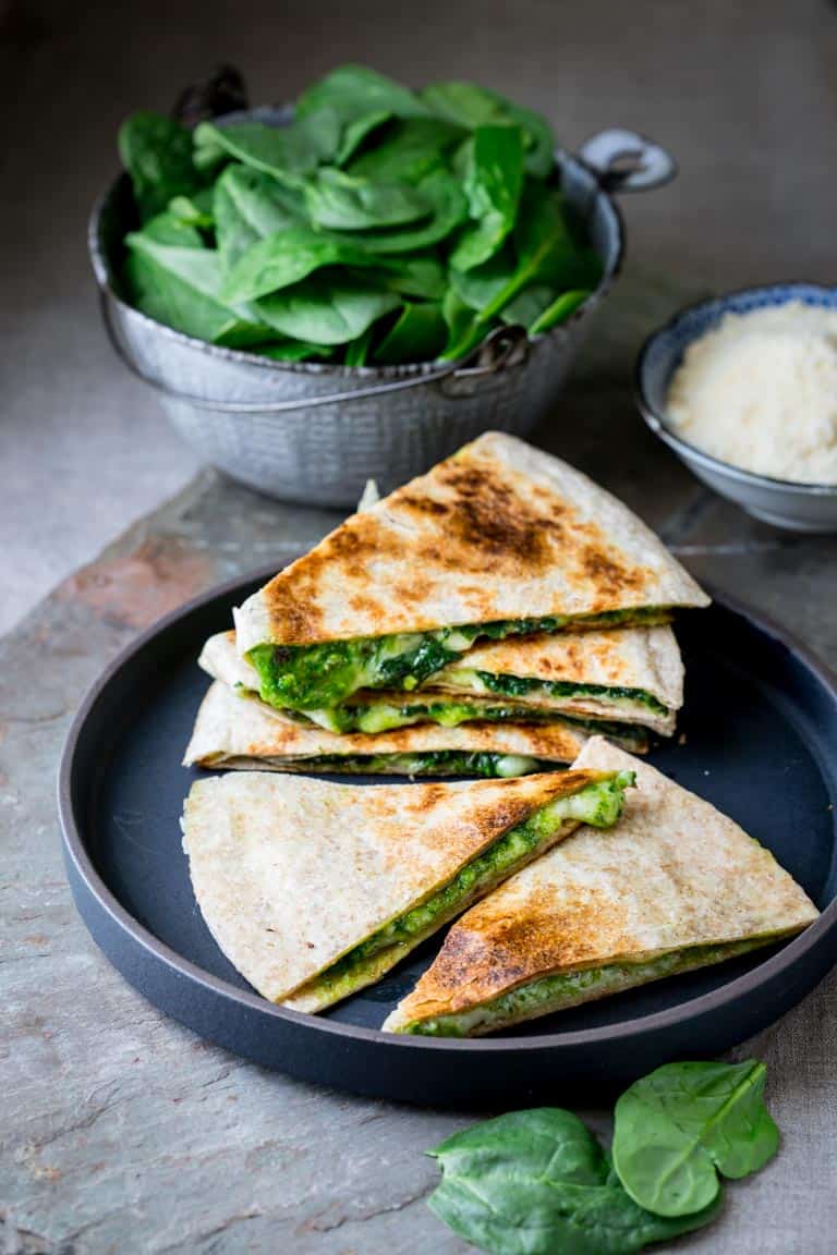 Vegetarian spinach pesto and cheddar quesadillas on a plate