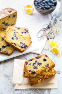 a table with several slices of blueberry lemon bread