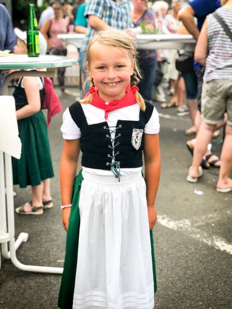 a little girl in traditional German clothing in the Mosel in Germany | healthyseasonalrecipes.com