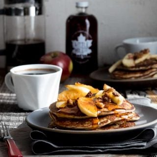 Behold, fall on a plate! These gluten-free Apple Protein Pancakes are going to be on your breakfast table for the entire fall season. Mark my words. They are made with oats, cottage cheese, eggs, and apples! You would never guess they don't have any flour in them! They're 106 calories each and have 7 grams protein each.