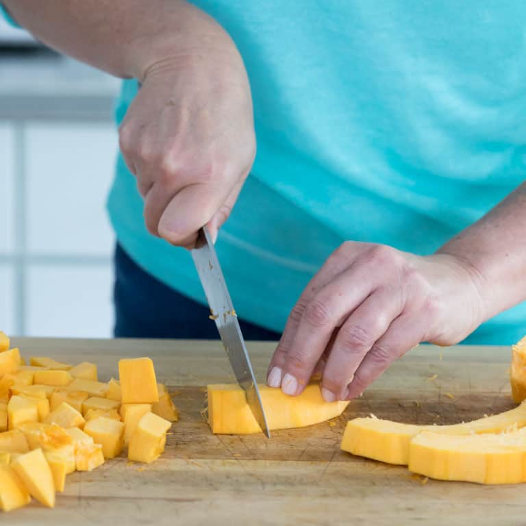 cut the strips of pumpkin into cubes