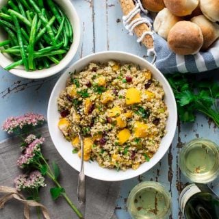 Please tell me you won't wait until Thanksgiving to try this Vegetarian Thanksgiving Pilaf with Pumpkin and Quinoa! It is too good to wait, and now that fresh pie pumpkins are in season, I highly recommend that you make it for dinner or serve it as a side dish. Seriously, don't wait. It's made with dried cranberries, leek and orange zest and it's naturally vegan and gluten-free so all the people will love it! #vegetarian #thanksgiving #pumpkin #quinoa #vegan #glutenfree #healthy #sidedish #onepot #stovetop #pilaf #healthyseasonal