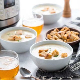 Today's new recipe for Easy Instant Pot Cream of Cauliflower Soup with Sharp White Cheddar Cheese is the first of my new pressure cooker recipes here on Healthy Seasonal Recipes. But if you haven't bought an instant pot yet, there's a slow cooker option as well. The recipe is naturally gluten-free and only 245 calories per cup!&nbsp; #glutenfree #vegetarian #cauliflower #soup #instantpot #pressurecooker