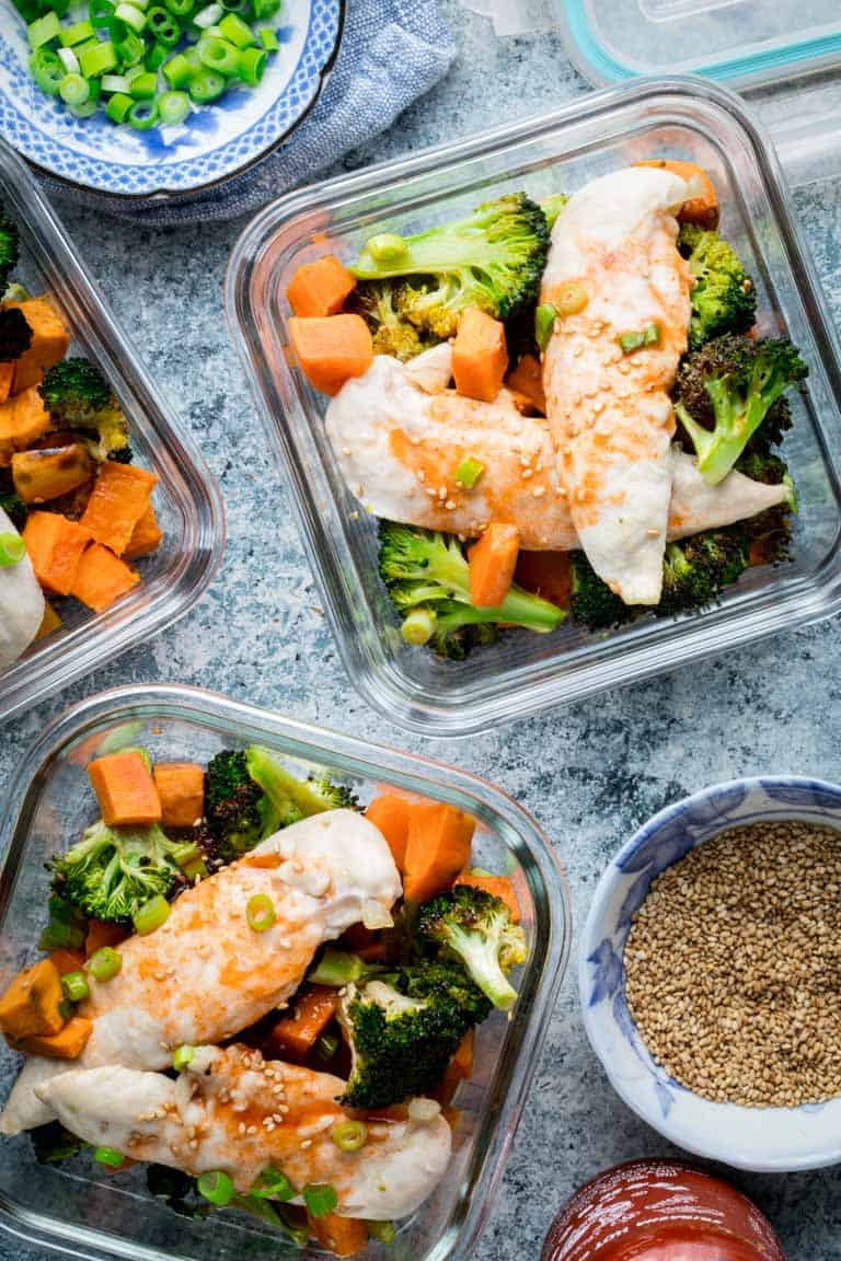 re-sealable glass containers with meal prep sheet pan chicken and broccoli