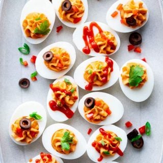 Spicy Deviled Eggs- close up with lots of toppings