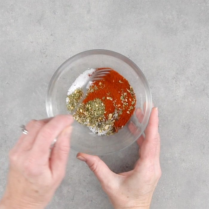 A glass bowl, with spices