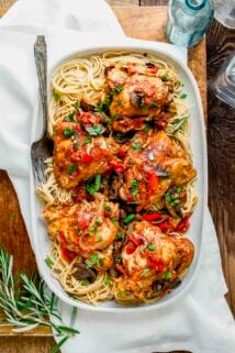 the platter with spaghetti and the cacciatore on top