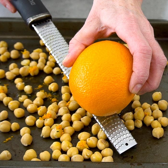 season with orange zest, thyme and salt