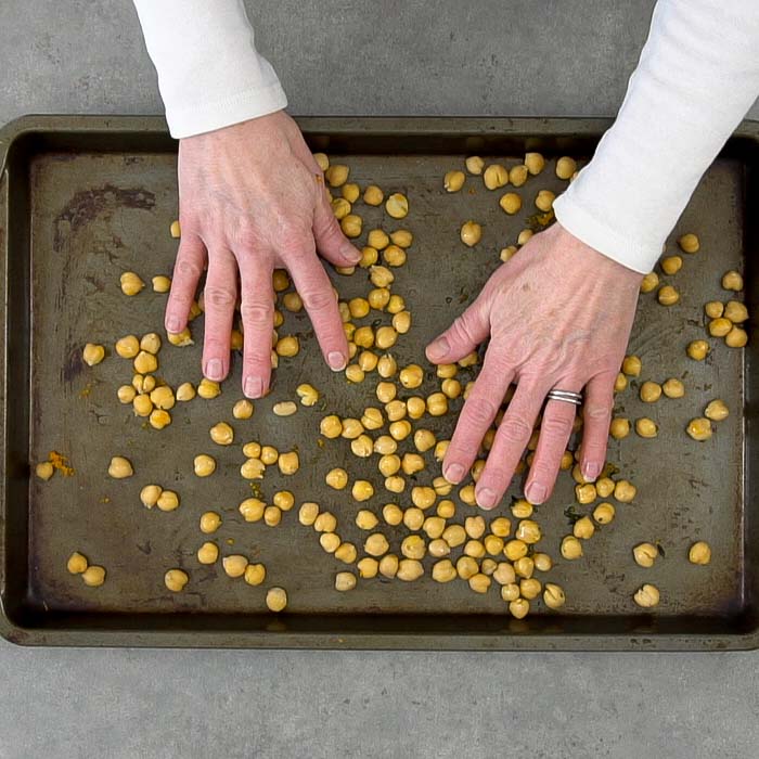 Make sure the chickpeas are coated using your hands