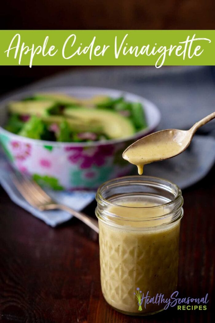 side view of apple cider vinaigrette with text overlay