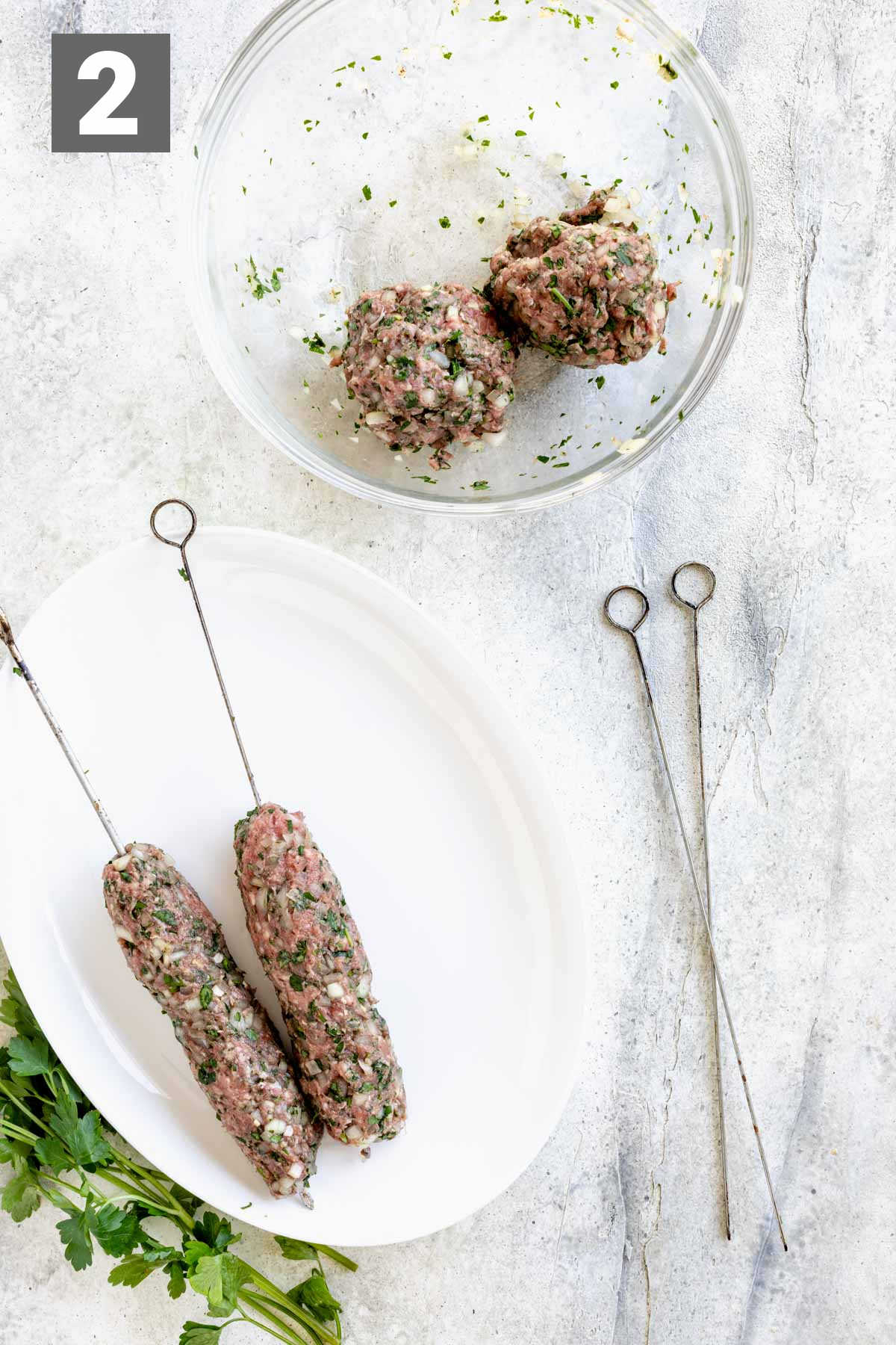 divide the mixture into four even portions. Shape and skewer