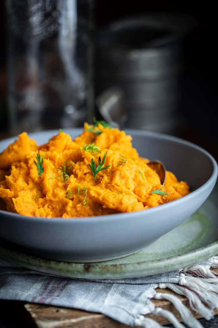 Mashed Carrots and Parsnips in a Gray Bowl.