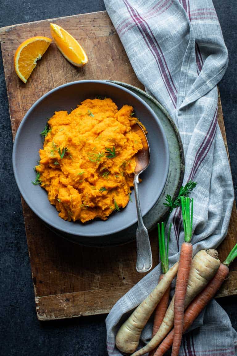 Mashed Carrots and Parsnips in a Gray Bowl.