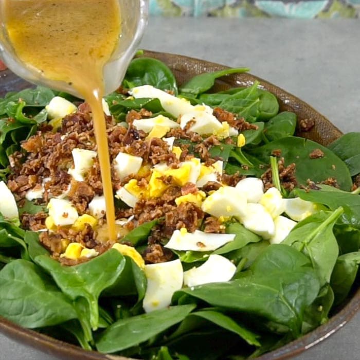 Drizzle with dressing and toss to combine.