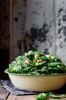 A bowl of salad, with Bacon and Egg