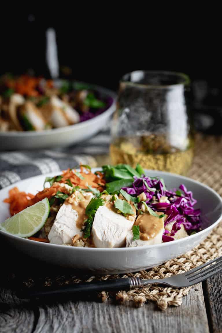 A side view of chicken quinoa bowl