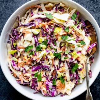 a closeup overhead view into a bowl of coleslaw