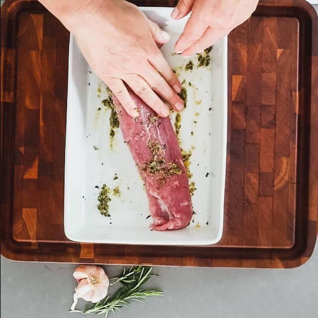 Rub the garlic rosemary mixture all over the pork tenderloin