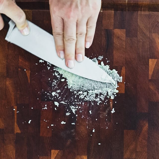 mash garlic into a paste