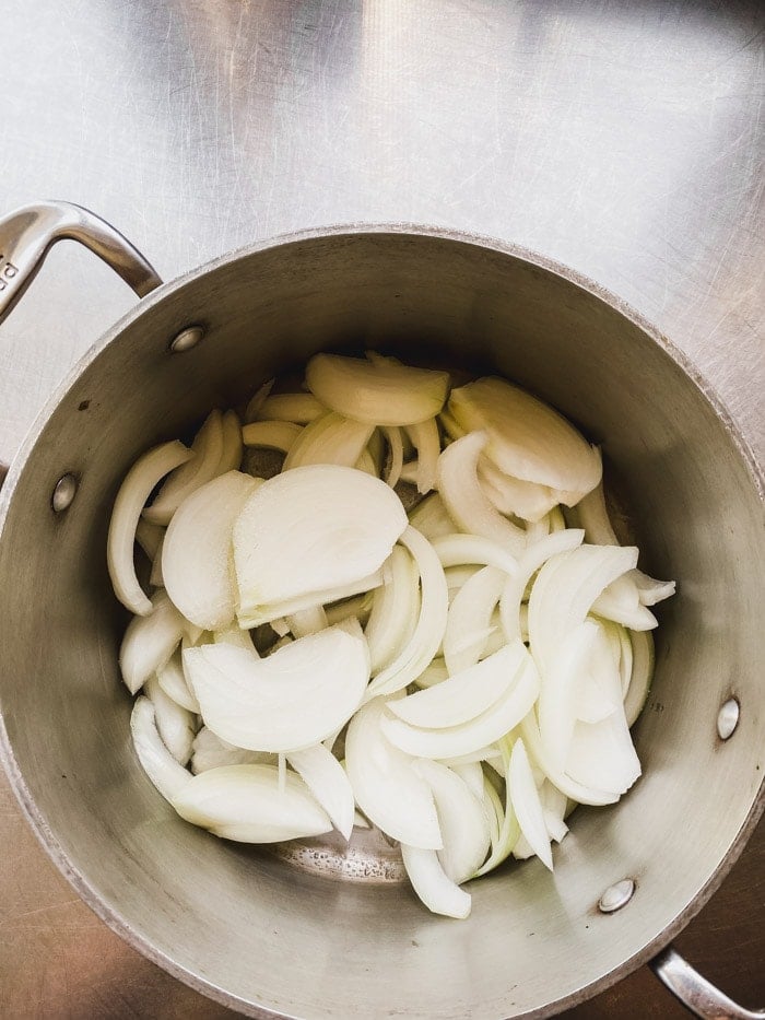 onions and salt in the cold saucepan