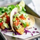 A close up from a side view of cod fish tacos