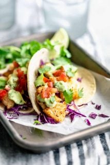 A close up from a side view of cod fish tacos