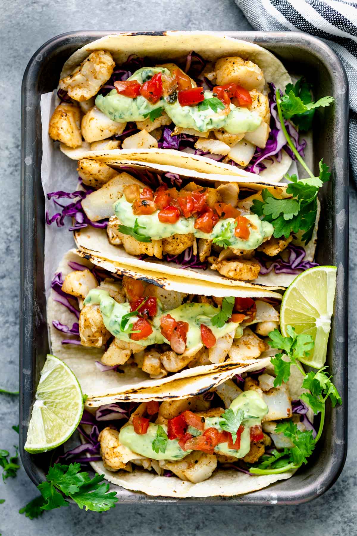 a tray filled with fish tacos from overhead