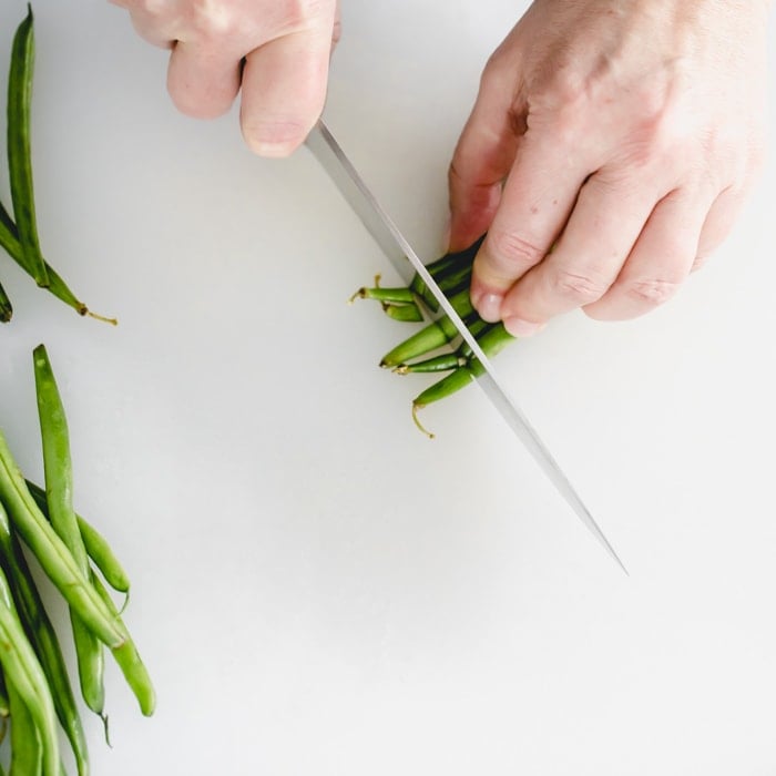 Cut stem ends off green beans
