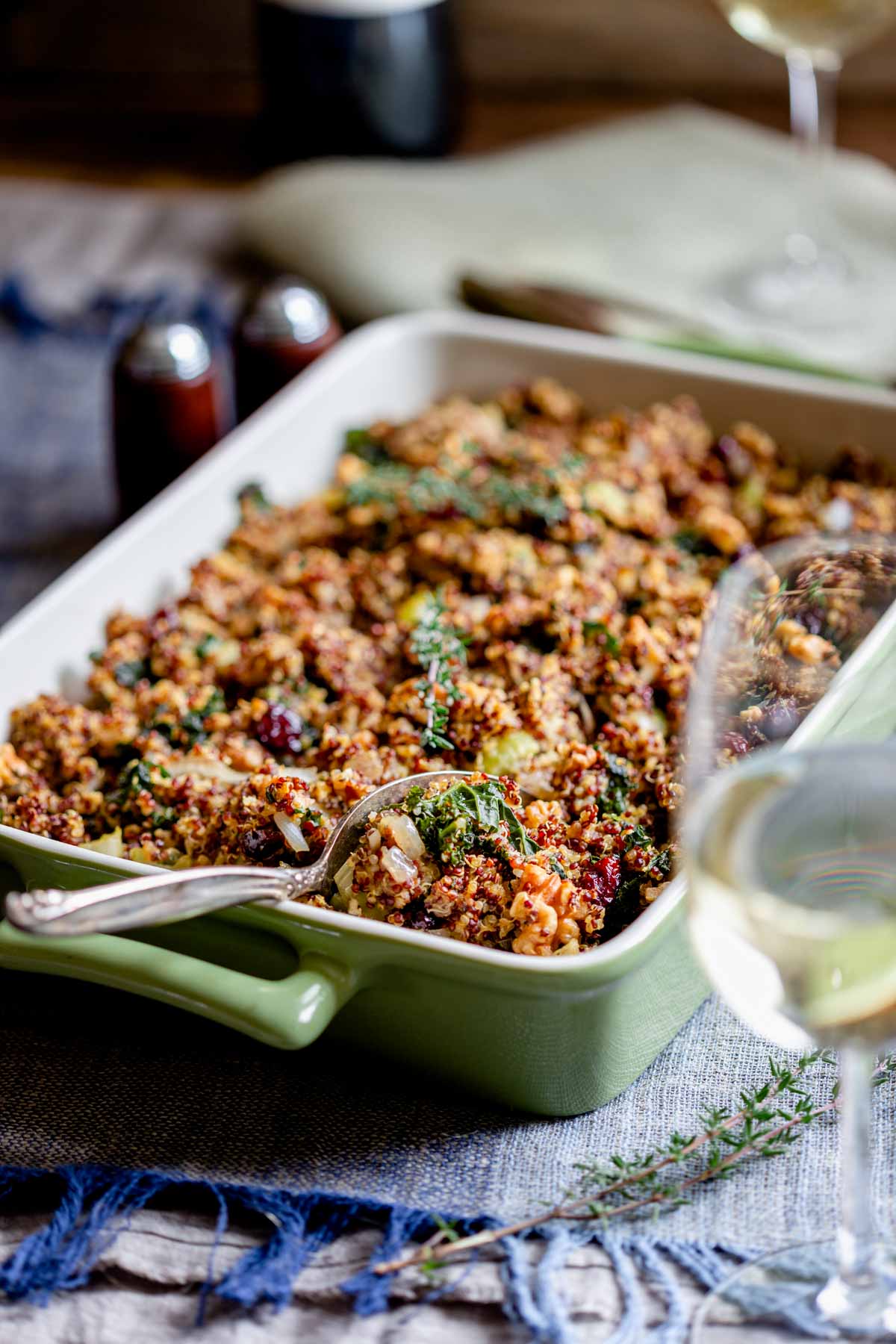 a side view of the stuffing with a wine glass in the foreground